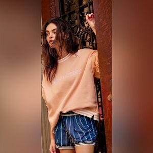 NWT FREE PEOPLE MOVEMENT ALL STAR COLLEGIATE PULLOVER PASTEL PEACH COMBO